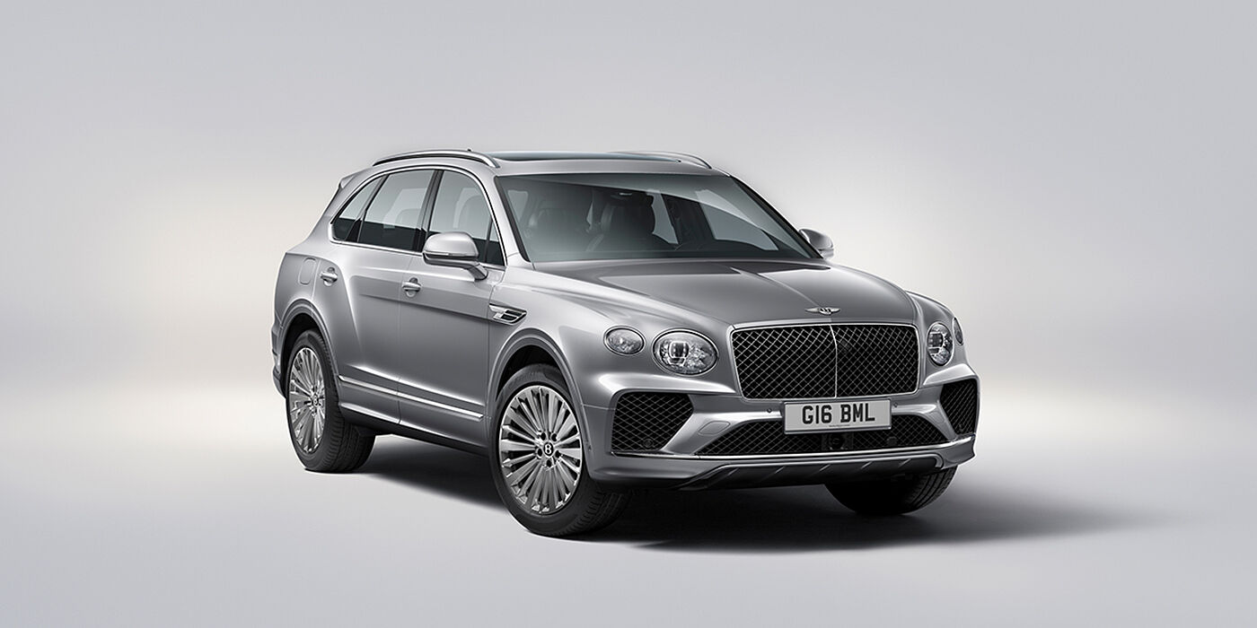 Bentley Warszawa Bentley Bentayga luxury SUV front three quarter view in Moonbeam paint with matrix grille and 21″ 5 spoke painted wheels