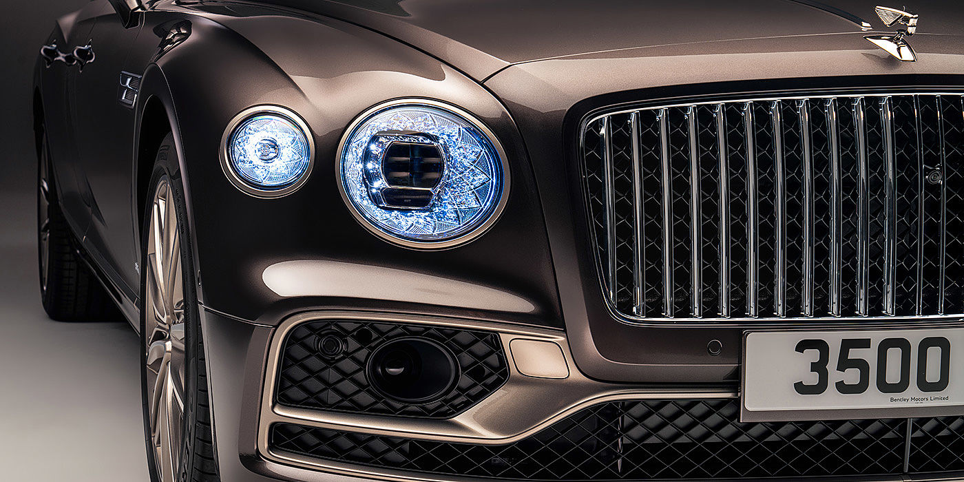 Bentley Warszawa Bentley Flying Spur Odyssean sedan front grille and illuminated led lamps with Brodgar brown paint