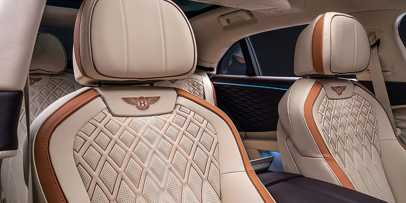 Bentley Warszawa Bentley Flying Spur Odyssean sedan rear seat detail with Diamond quilting and Linen and Burnt Oak hides
