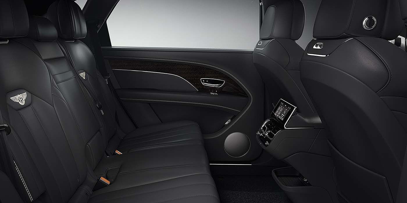 Bentley Warszawa Bentley Bentayga EWB SUV rear interior in Beluga black leather