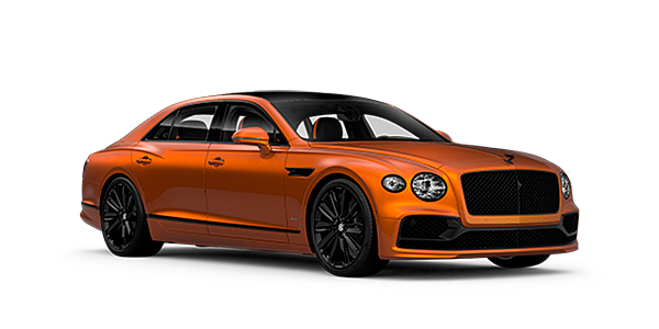 Bentley Warszawa Bentley Flying Spur Speed front side angled view in Orange Flame coloured exterior. 
