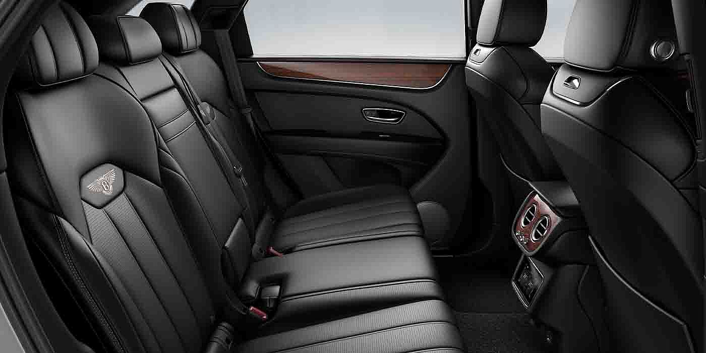 Bentley Warszawa Bentley Bentayga EWB interior view for rear passengers with Beluga black hide.