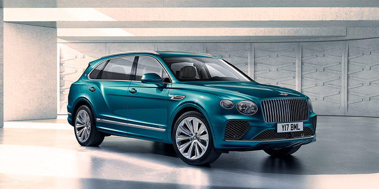 Bentley Warszawa Bentley Bentayga Extended Wheelbase Azure SUV front three quarter in Topaz blue paint colour with a grey background