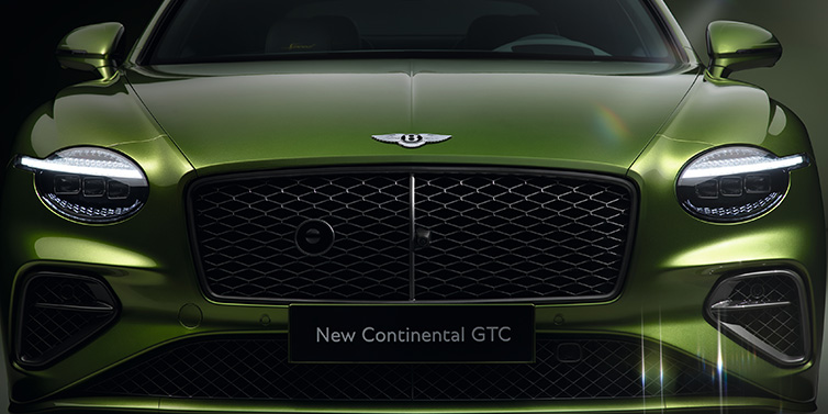 Bentley Warszawa Bentley Continental GTC Speed convertible front bonnet detail in Tourmaline Green paint showing new light design