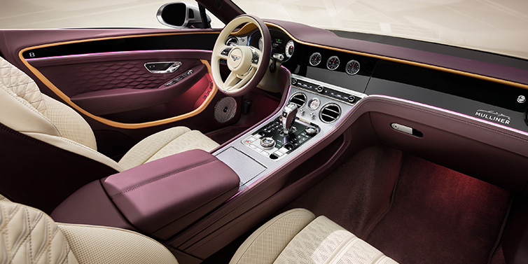 Bentley Warszawa Bentley Continental GTC Mulliner convertible front interior including Linen and Damson purple hides and Grand Black veneer